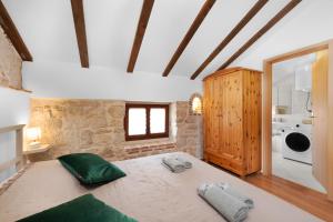 a bedroom with a large bed in a room at Villa Vrsar in Vrsar