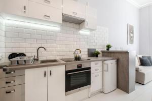 Kuchyňa alebo kuchynka v ubytovaní Lumina 2-level apart near Lodz Fabryczna