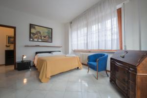 Postel nebo postele na pokoji v ubytování Residence Palazzo Gasparroni