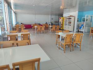 a dining room with tables and chairs and a cafeteria at HOTEL YAGMUR in Anamur +39 photos