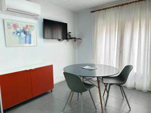 A television and/or entertainment centre at Agi Arago Studio