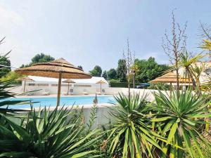 Bazén v ubytování Camping L'orée des Bois - ATC Routes du Monde ATC - Saint-Pierre d'Oléron nebo v jeho okolí
