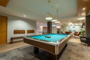 a billiard room with a pool table at Spar Hotel Gårda in Gothenburg