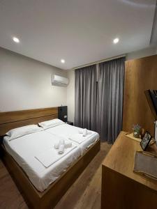 Postel nebo postele na pokoji v ubytování Urban Room 4
