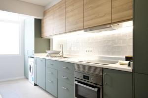 Η κουζίνα ή μικρή κουζίνα στο GuestReady - Serenity by the Sea near Funchal Bay