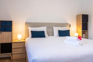Postel nebo postele na pokoji v ubytování GuestReady - Panoramic Mountain Escape