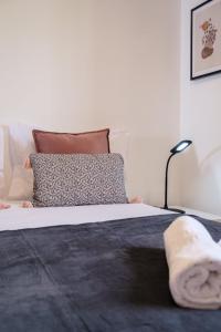 Postel nebo postele na pokoji v ubytování GuestReady - Tranquil Nest in Funchal + 26 fotografií