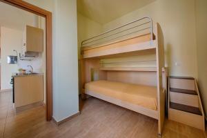 Postel nebo postele na pokoji v ubytování Residence Palazzo Gasparroni