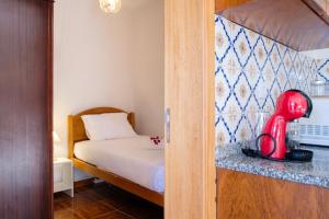Postel nebo postele na pokoji v ubytování GuestReady - Machico sea view residence - B