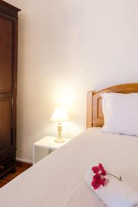 Postel nebo postele na pokoji v ubytování GuestReady - Machico sea view residence - B