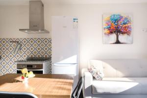 Kuchyň nebo kuchyňský kout v ubytování GuestReady - Machico sea view residence - B