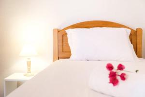 Postel nebo postele na pokoji v ubytování GuestReady - Machico sea view residence - B