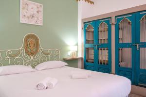 Postel nebo postele na pokoji v ubytování GuestReady - A marvellous stay in Calheta