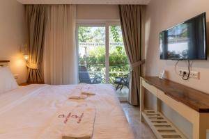 TV a/nebo společenská místnost v ubytování HOTEL DALYANCE