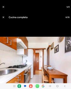 Η κουζίνα ή μικρή κουζίνα στο suite metro Bussero 1