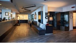 TV a/nebo společenská místnost v ubytování Hotel Concorde