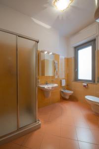 Koupelna v ubytování Residence Palazzo Gasparroni