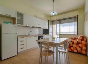Kuchyň nebo kuchyňský kout v ubytování Residence Palazzo Gasparroni