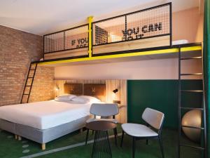 Ein Bett oder Betten in einem Zimmer der Unterkunft HUP