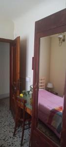Posteľ alebo postele v izbe v ubytovaní Albergo del Ponte