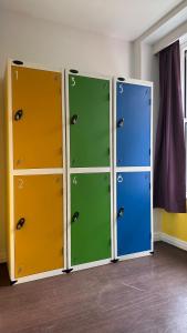 a row of lockers in a room at Safestay Edinburgh Cowgate in Edinburgh
