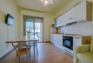 Kuchyň nebo kuchyňský kout v ubytování Residence Palazzo Gasparroni