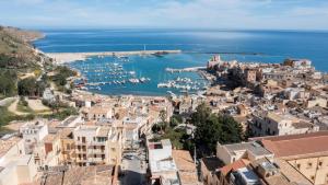 an aerial view of a city with a harbor at Ciuriddu Appartamenti in Castellammare del Golfo