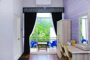 Balkón nebo terasa v ubytování CROWN REGENCY- BADULLA