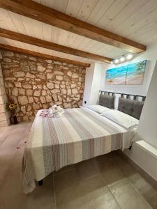 A bed or beds in a room at Villa Stella Még 37 kép