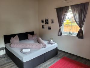 Ένα ή περισσότερα κρεβάτια σε δωμάτιο στο Zur Tilli