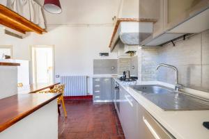 Kuchyň nebo kuchyňský kout v ubytování Cerchi 3 + 29 fotografií