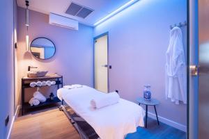 A bed or beds in a room at Alexandre FrontAir Congress