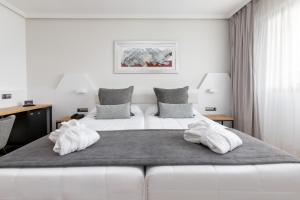 A bed or beds in a room at Alexandre FrontAir Congress