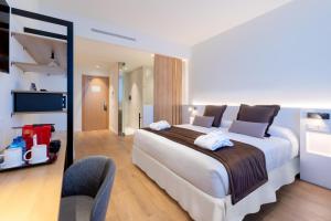 A bed or beds in a room at Alexandre FrontAir Congress