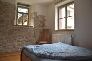 Postel nebo postele na pokoji v ubytování Ferienhaus an der Höh'