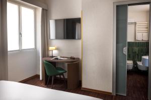 Postel nebo postele na pokoji v ubytování Maison Roma Piazza di Spagna UNA Esperienze