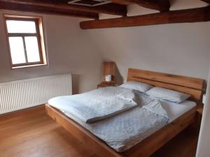 Postel nebo postele na pokoji v ubytování Ferienhaus an der Höh'