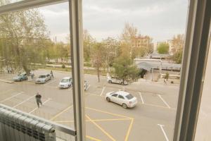 a view from a window of a parking lot at HOTEL MERCURI-MERIDIAN in Bukhara