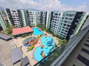 an aerial view of a pool at a resort at Manhattan Condomium Water Park Land @ Ipoh in Ipoh