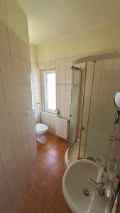 Kúpeľňa v ubytovaní Apartman Danka