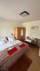 Posteľ alebo postele v izbe v ubytovaní Apartman Danka