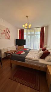 Posteľ alebo postele v izbe v ubytovaní Apartman Danka