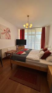 Posteľ alebo postele v izbe v ubytovaní Apartman Danka