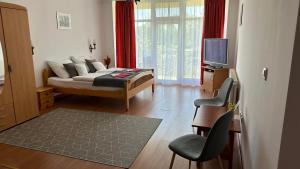 Posteľ alebo postele v izbe v ubytovaní Apartman Danka