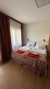 Posteľ alebo postele v izbe v ubytovaní Apartman Danka