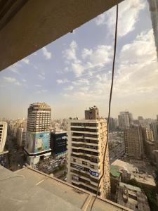 a view of a city from a skyscraper at المهندسين جزيره العرب in Cairo