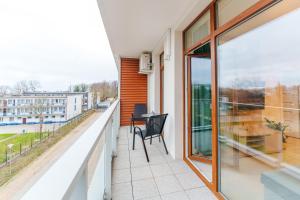 Un balcon sau o terasă la Apartament Eco Modern IV by HolidaySun