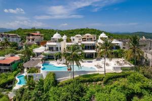 an aerial view of a large white house at 1013 - Villa Maya in Santa Cruz Huatulco