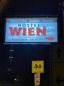 a sign for a hostel with a hotel sign at HOSTEL WIEN in Barakovići
