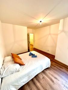 a bedroom with a bed with two pillows on it at Elegant apartment Paris Bagnolet 303 in Bagnolet